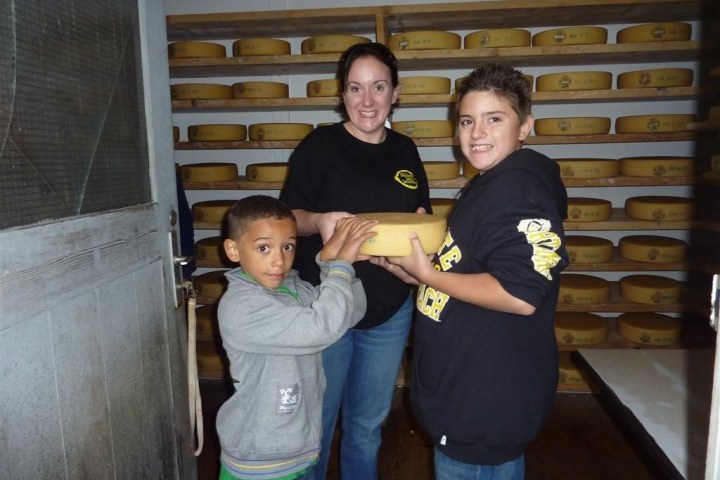 family holding a cheese