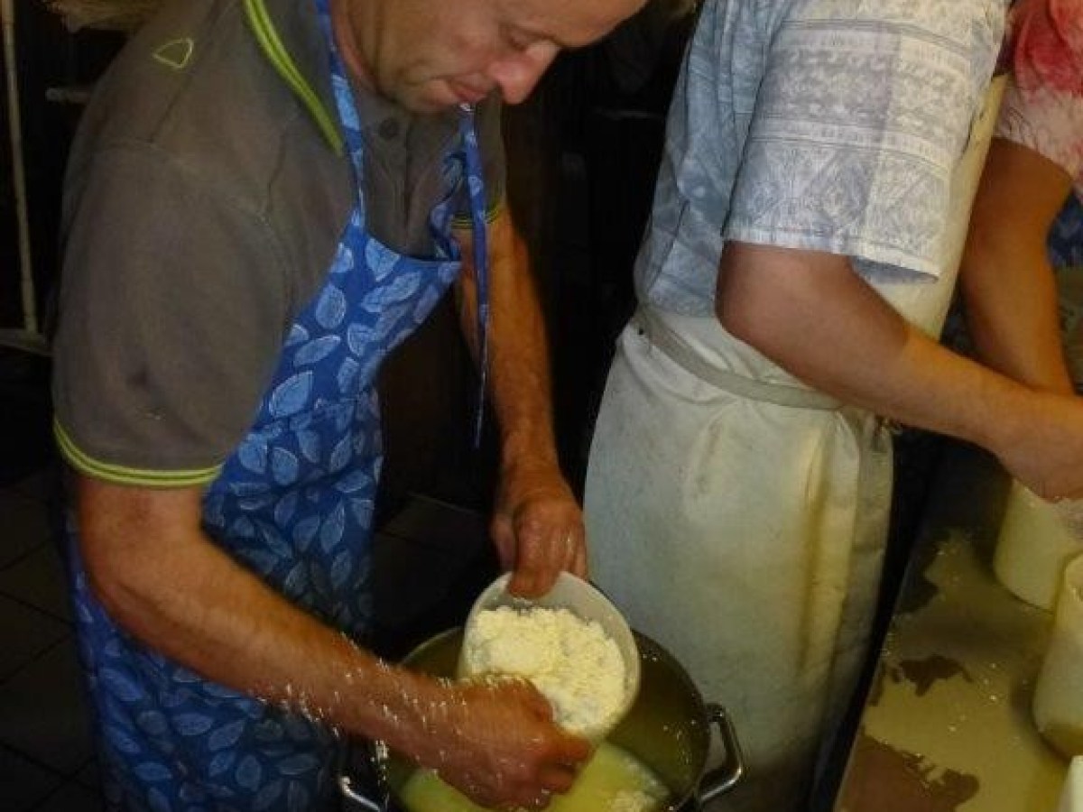 putting the smash cheese dough in a bucket