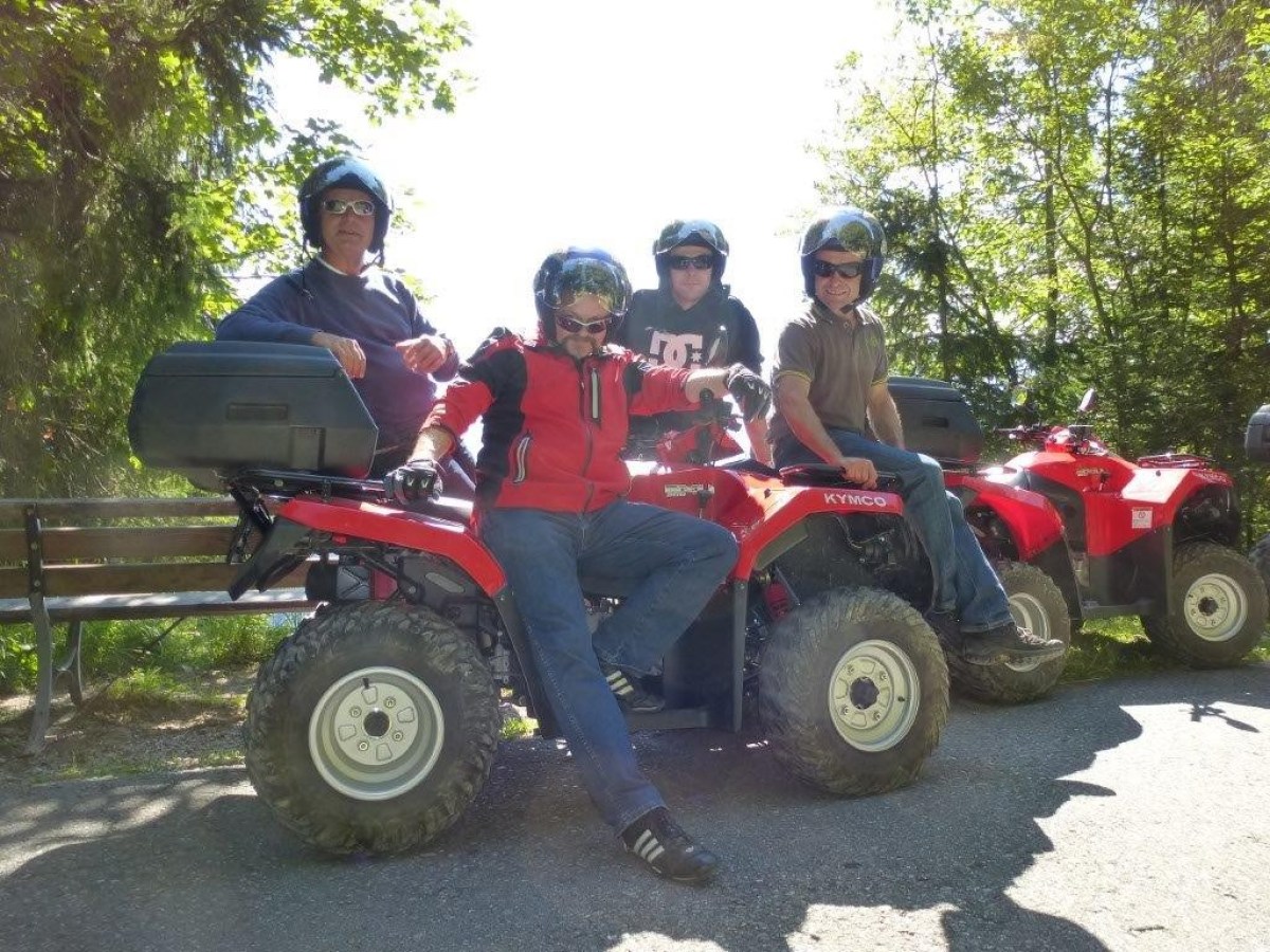 4 men with 2 red quads