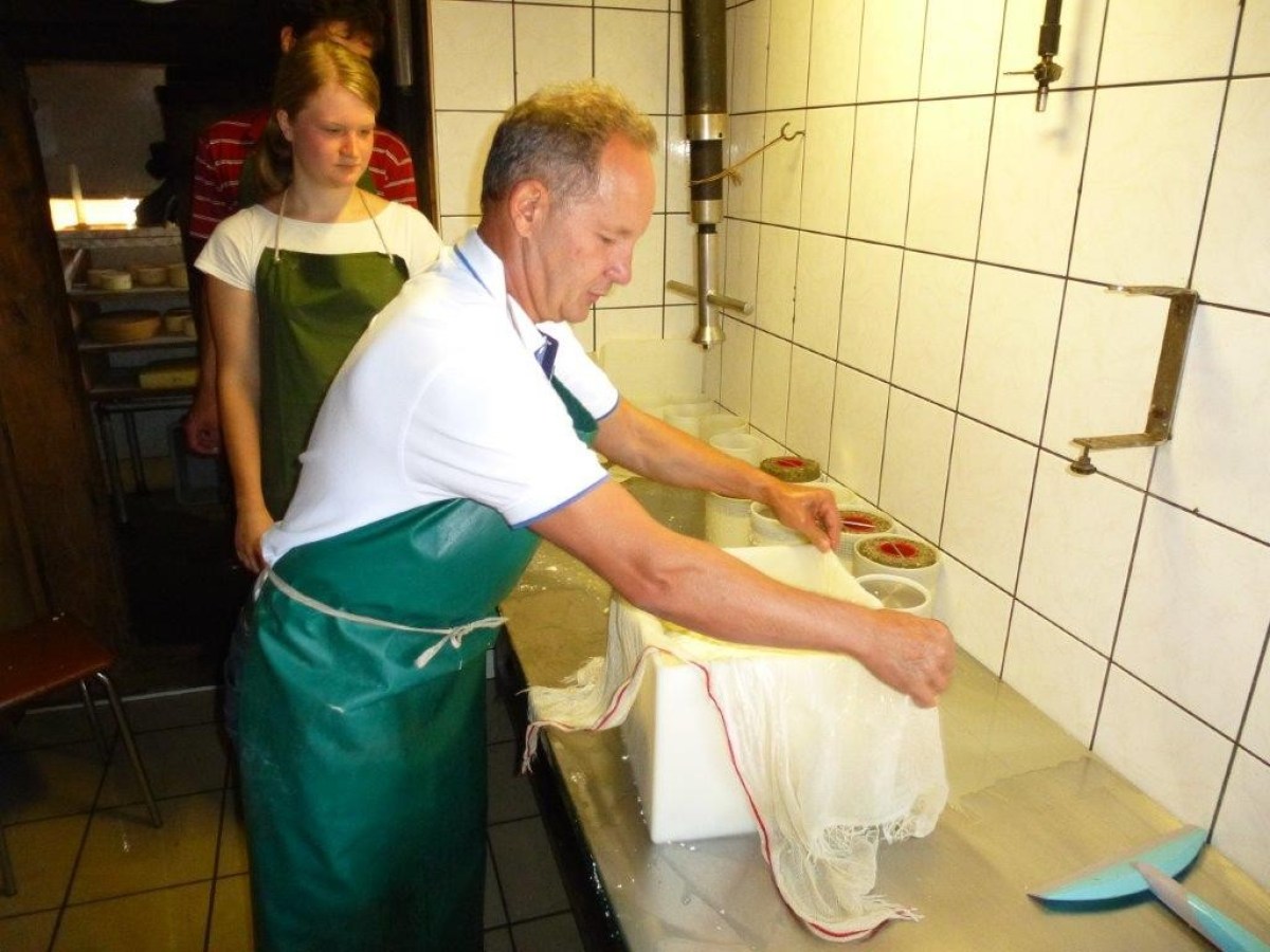 covering the cheese with a thin layer