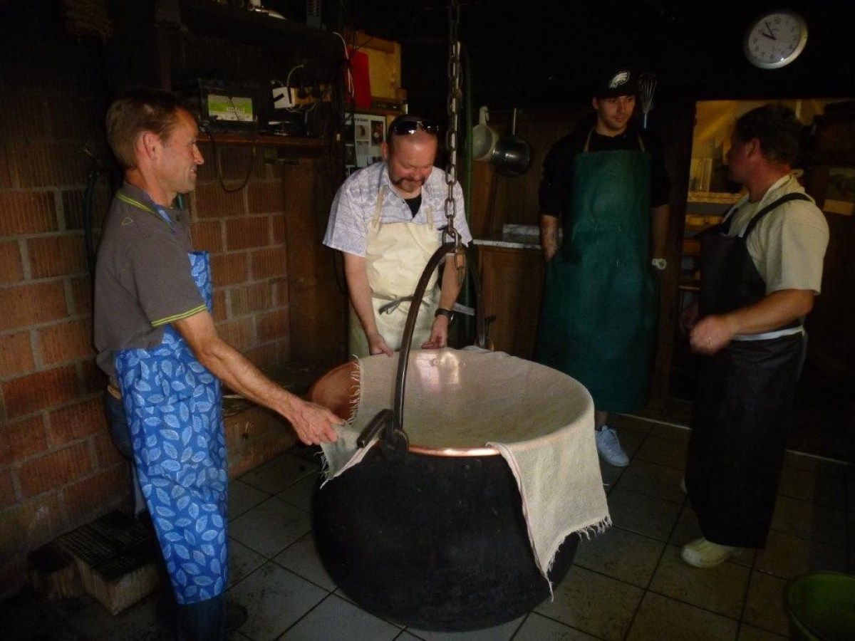 putting a fabric on a cheese pot