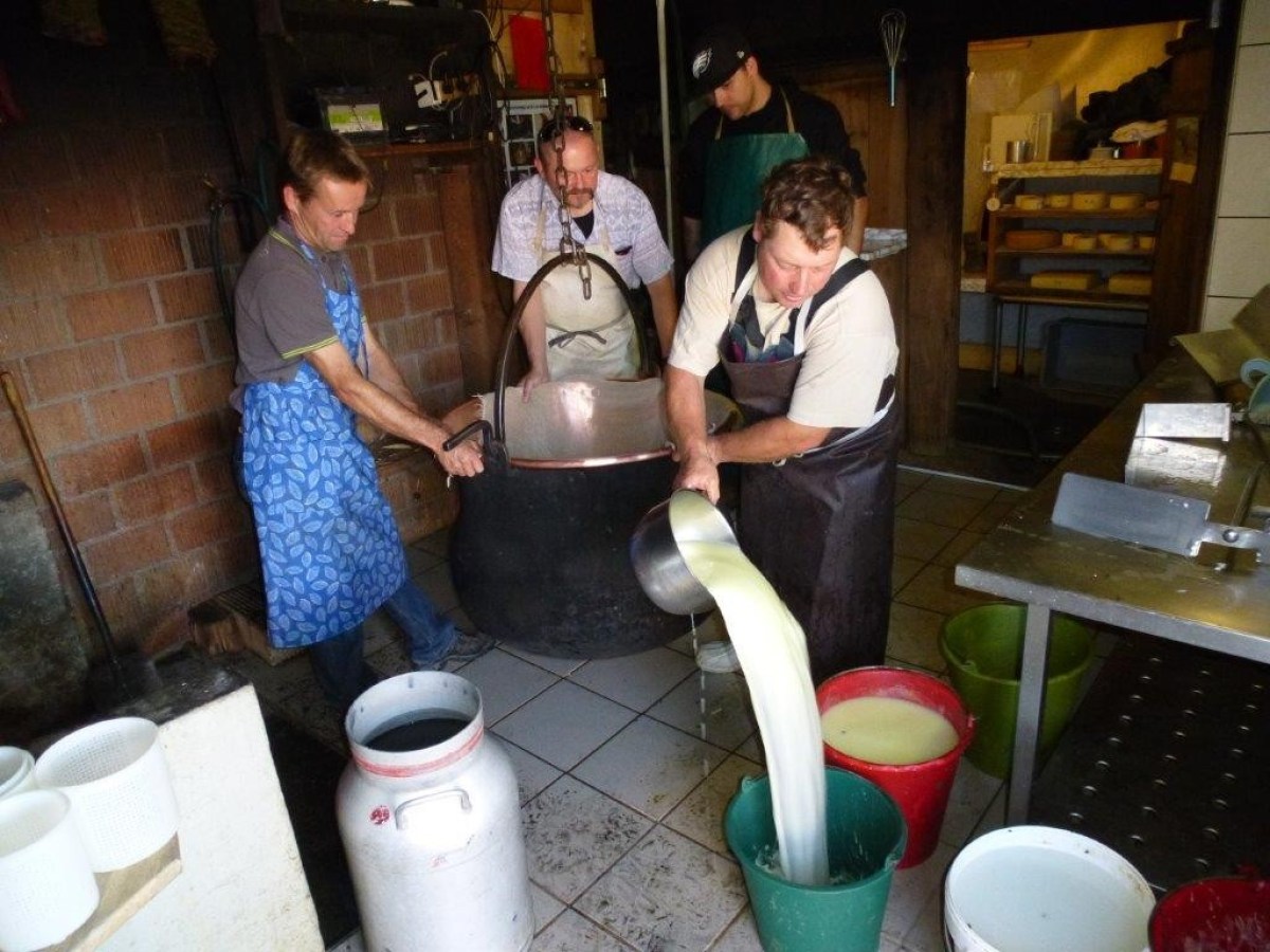 pouring water into a bucket