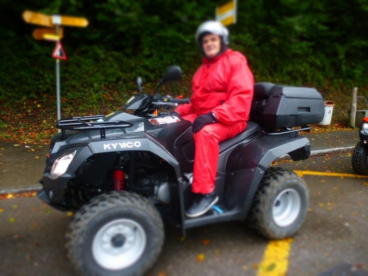 man on a black quad