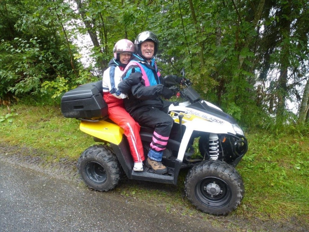 couple on a yellow and white quad