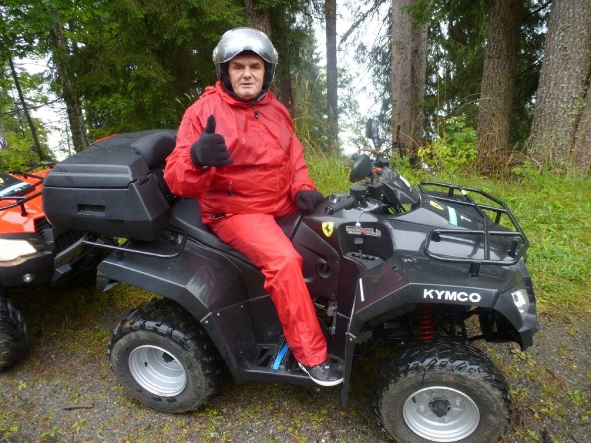 man on a black quad