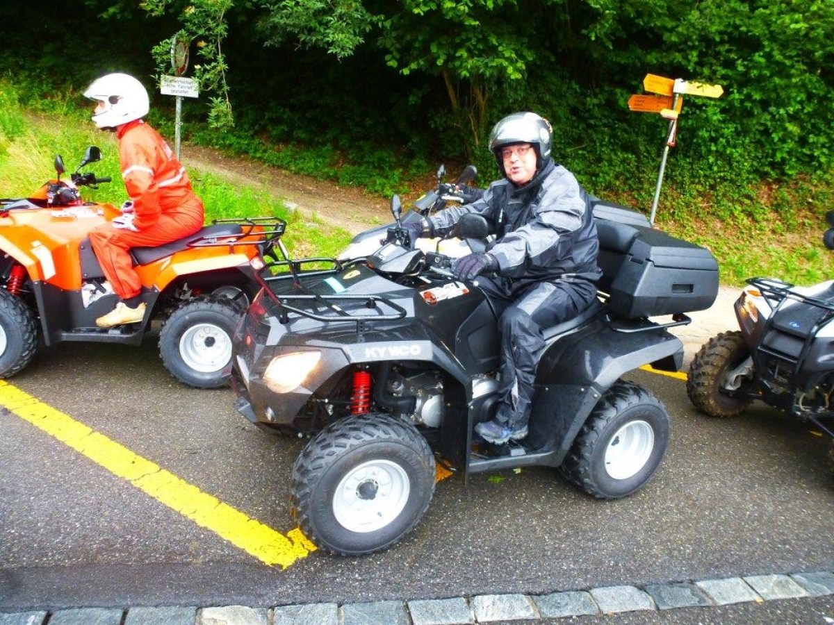 man on a black quad