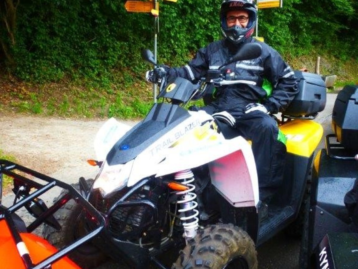 man with a helmet on a quad