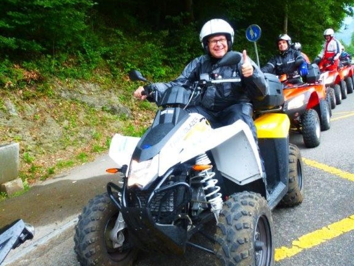 man doing thumbs up on a quad