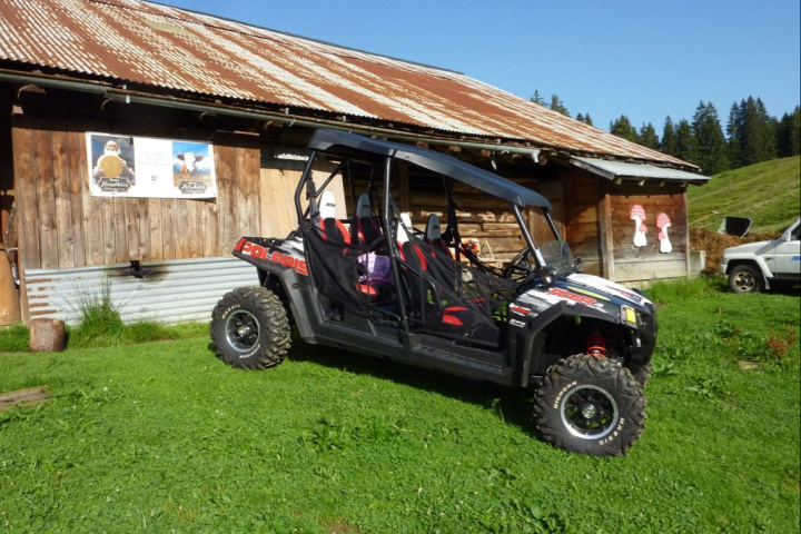 4x4 parked in front of a house