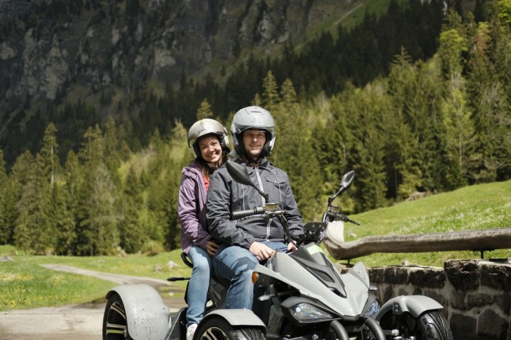 a person sitting on a motorcycle