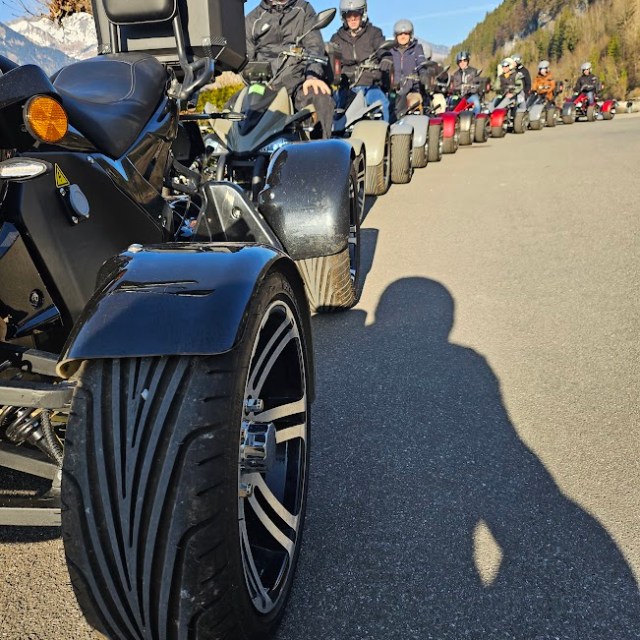 a motorcycle is parked on the side of a road